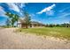 Spacious brick home with long driveway, oversized lot and well-manicured lawn at 41020 Us Highway 36, Bennett, CO 80102