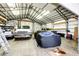 Inside the over-sized outbuilding/garage, with cars, trucks and equipment at 41020 Us Highway 36, Bennett, CO 80102