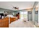 Serene main bedroom with a walk-out to balcony, with great natural light, and generous closet space at 41020 Us Highway 36, Bennett, CO 80102