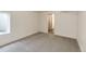 Spacious basement bedroom with grey carpet and ensuite bathroom at 3525 E 7Th Avenue Pkwy, Denver, CO 80206