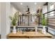 Modern kitchen viewed from a split level at 3525 E 7Th Avenue Pkwy, Denver, CO 80206