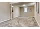 Finished basement area with neutral paint, carpeted floors and natural light at 10420 Marion St, Northglenn, CO 80233