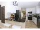 Renovated kitchen with stainless steel appliances and granite countertops at 10420 Marion St, Northglenn, CO 80233