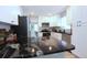 Stylish kitchen with granite counters, white cabinets and stainless steel appliances at 10420 Marion St, Northglenn, CO 80233