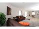 Spacious living room with comfortable seating, bright light and fresh paint at 10420 Marion St, Northglenn, CO 80233