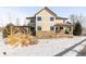 Spacious backyard with pergola and snow cover at 1669 S De Gaulle Way, Aurora, CO 80018