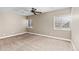 Bright and airy bedroom with ceiling fan and neutral decor at 1669 S De Gaulle Way, Aurora, CO 80018