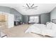 Main bedroom with vaulted ceiling, ceiling fan, and carpet at 1669 S De Gaulle Way, Aurora, CO 80018