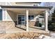 Covered patio provides outdoor space for relaxation at 1669 S De Gaulle Way, Aurora, CO 80018