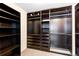 Large walk-in closet with ample shelving and hanging space at 1669 S De Gaulle Way, Aurora, CO 80018