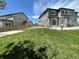 Large backyard features a well-maintained lawn, patio, and privacy fence, ideal for outdoor enjoyment at 3508 Silverado Cir, Frederick, CO 80516