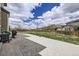 Expansive backyard with well-maintained lawn and patio area, ideal for outdoor entertaining at 3508 Silverado Cir, Frederick, CO 80516