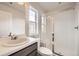 Bathroom offering clean lines, a glass enclosed shower and lots of natural light at 3508 Silverado Cir, Frederick, CO 80516