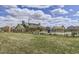 Beautiful community area with clubhouse, playground, and green space, perfect for Gathering activities at 3508 Silverado Cir, Frederick, CO 80516