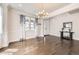 Elegant dining room featuring hardwood floors and plenty of natural light at 3508 Silverado Cir, Frederick, CO 80516