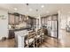 Modern kitchen boasts stainless steel appliances, granite countertops, and a large island with seating at 3508 Silverado Cir, Frederick, CO 80516