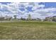 Large open space with manicured green lawn offers residents recreation area and community connections at 3508 Silverado Cir, Frederick, CO 80516