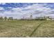 Large open space with community buildings offers residents recreation area and community connections at 3508 Silverado Cir, Frederick, CO 80516