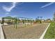 A vibrant playground with swings and a slide offers an inviting space for to play and socialize outdoors at 3508 Silverado Cir, Frederick, CO 80516