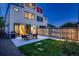 Well-maintained backyard with a patio, grill, and ample space for outdoor activities at 3911 Mariposa St, Denver, CO 80211