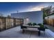 Private backyard with a spacious patio area, great for outdoor dining and entertaining at 3911 Mariposa St, Denver, CO 80211