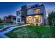 Modern home with a well-kept lawn, sidewalk access, and inviting curb appeal at 3911 Mariposa St, Denver, CO 80211