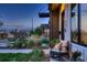 Cozy front porch with a rocking chair, scenic views, and a well-maintained garden at 3911 Mariposa St, Denver, CO 80211