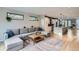 Cozy living room with hardwood floors, stylish decor, and an open floor plan at 3911 Mariposa St, Denver, CO 80211