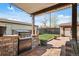 Outdoor kitchen and patio area with built-in grill at 10769 Murray Dr, Northglenn, CO 80233