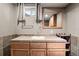 Bathroom featuring vanity with wood cabinets at 10769 Murray Dr, Northglenn, CO 80233