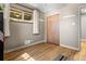 Cozy bedroom featuring hardwood floors, neutral-toned walls, and a closet at 10769 Murray Dr, Northglenn, CO 80233