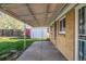 The back patio leads out to the backyard with a covered area at 3430 N Clayton St, Denver, CO 80205