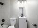 Updated bathroom featuring shower-tub combo with white tiled walls and black fixtures at 3430 N Clayton St, Denver, CO 80205