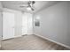 Bedroom features hardwood floors, natural light, and neutral color palette at 3430 N Clayton St, Denver, CO 80205