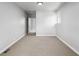Open carpeted bedroom with great natural light and closet at 3430 N Clayton St, Denver, CO 80205