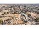 Scenic aerial view of the property with sprawling horse facilities and neighborhood at 1930 Altura Blvd, Aurora, CO 80011