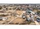 Aerial view showing the entire property with horse amenities and a nearby residential area at 1930 Altura Blvd, Aurora, CO 80011