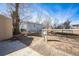 Backyard features a trampoline, shed, and plenty of open space at 1930 Altura Blvd, Aurora, CO 80011