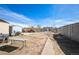 Large backyard with multiple outbuildings and ample space for activities at 1930 Altura Blvd, Aurora, CO 80011
