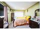 Cozy bedroom featuring a queen bed, soft lighting, and closet for ample storage at 1930 Altura Blvd, Aurora, CO 80011