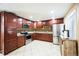 Modern kitchen featuring stainless steel appliances, ample cabinet space, and tiled backsplash at 1930 Altura Blvd, Aurora, CO 80011