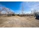 Spacious paddock with sturdy fencing, metal shelters, and plenty of room for outdoor activities at 1930 Altura Blvd, Aurora, CO 80011