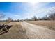 Expansive property with a long driveway and ample space for parking and outdoor activities at 1930 Altura Blvd, Aurora, CO 80011