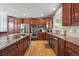 Beautiful kitchen with stainless steel appliances, granite countertops, and ample cabinet space at 14049 Detroit Dr, Thornton, CO 80602