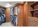 Spacious walk-in closet with custom shelving, hanging rods, and ample storage at 14049 Detroit Dr, Thornton, CO 80602