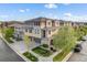 Stunning home featuring a blend of stone and stucco with well-kept lawns and a two-car garage at 3291 Cascina Cir # D, Highlands Ranch, CO 80126