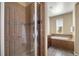 Primary bathroom featuring tiled shower and tub at 3291 Cascina Cir # D, Highlands Ranch, CO 80126