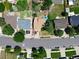 Aerial view showing the neighborhood with well-maintained streets, various homes, and green spaces at 20391 E 42Nd Ave, Denver, CO 80249
