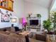 Bright and spacious living room with high ceilings and decorative features at 20391 E 42Nd Ave, Denver, CO 80249