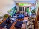 Cozy living room with a fireplace, natural light, and artistic decor creating a warm, inviting atmosphere at 20391 E 42Nd Ave, Denver, CO 80249